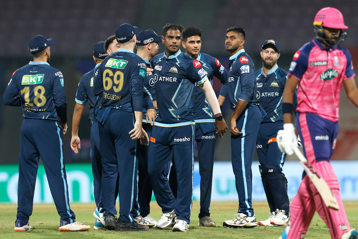 Gujarat Titans's Yash Dayal celebrates with teammates on scalping the wicket of Devdutt Padikkal, his maiden IPL wicket on Thursday