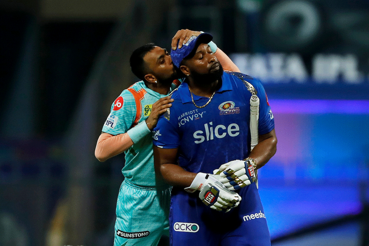 Lucknow Super Giants' Krunal Pandya celebrates the wicket of MI's Keiron Pollard