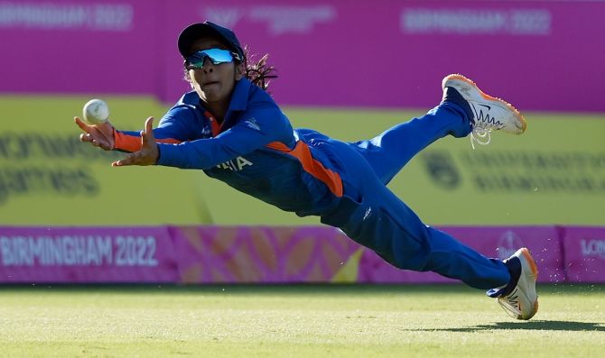 India's Jemimah Rodrigues makes a vain bid to hold on to a catch from Australia's Jess Jonassen during the Commonwealth Games women's T20 cricket final at Edgbaston on Sunday.