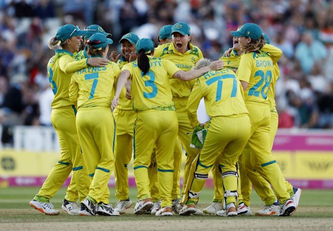 Australia's players celebrate beating India in the Commonwealth Games final in Birmingham, where women's Twenty20 cricket made its debut.