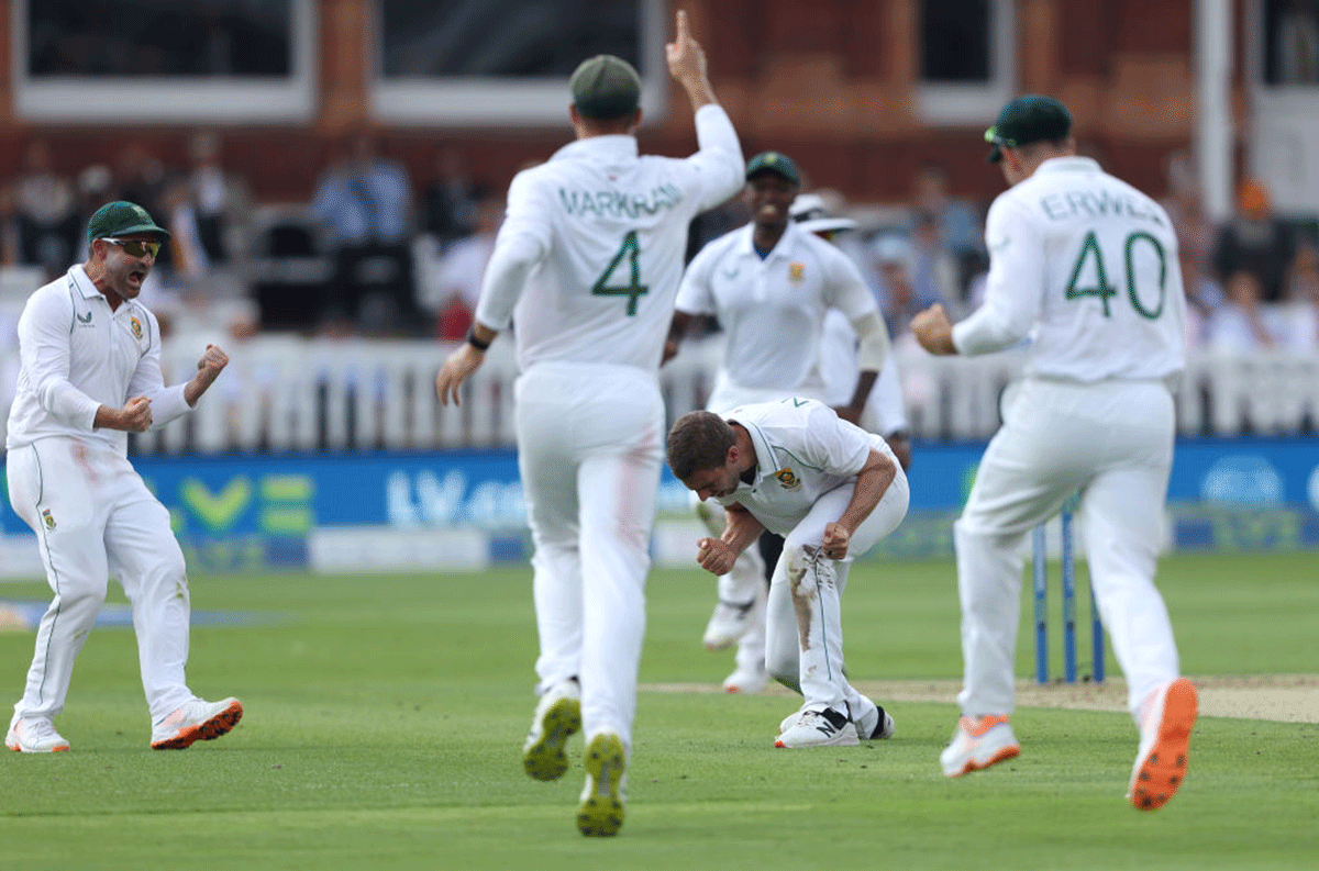 South Africa's Anrich Nortje  celebrates on dismissing England captain Ben Stokes