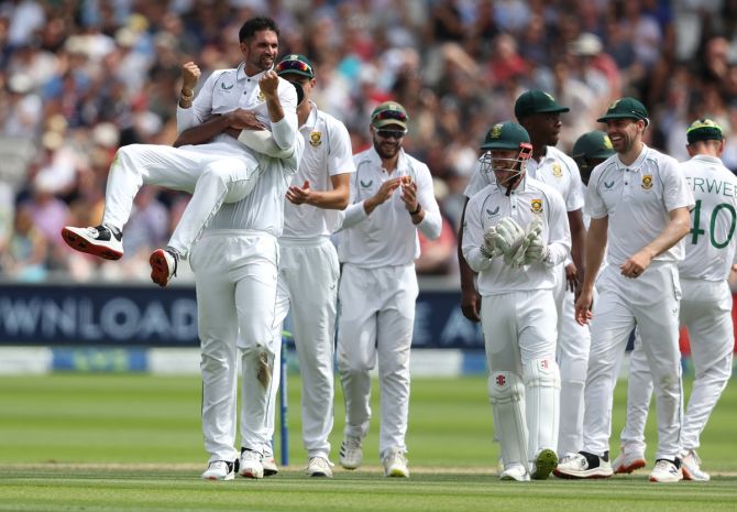 South Africa spinner Keshav Maharaj celebrates taking the wicket of England's Ollie Pope during Day 3 of the first Test, at Lord's Cricket Ground in London, on Friday.