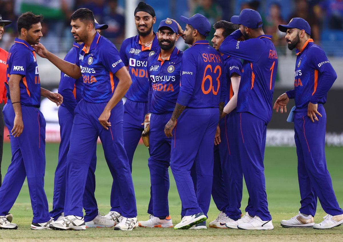 India's players celebrate the wicket of Pakistan's Fakhar Zaman