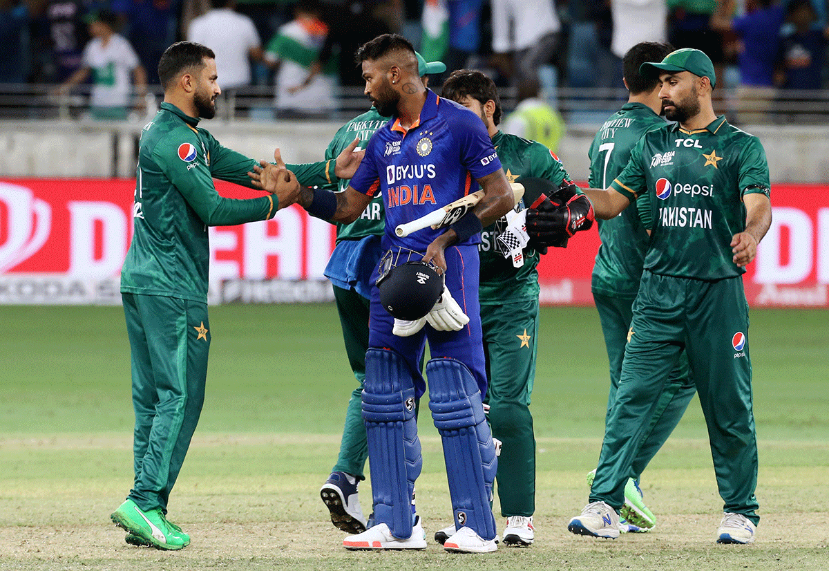 India's Hardik Pandya is congratulated by Pakistan players after their Asia Cup match at the Dubai International Stadium, Dubai, United Arab Emirates, on Sunday