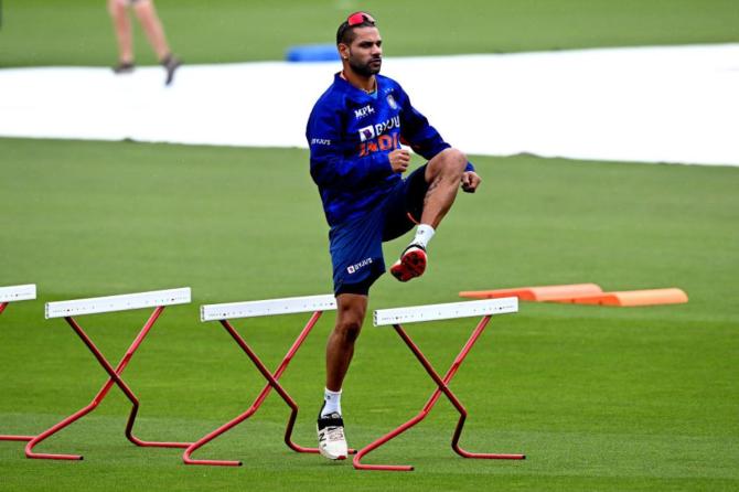 Shikhar Dhawan of India warms up