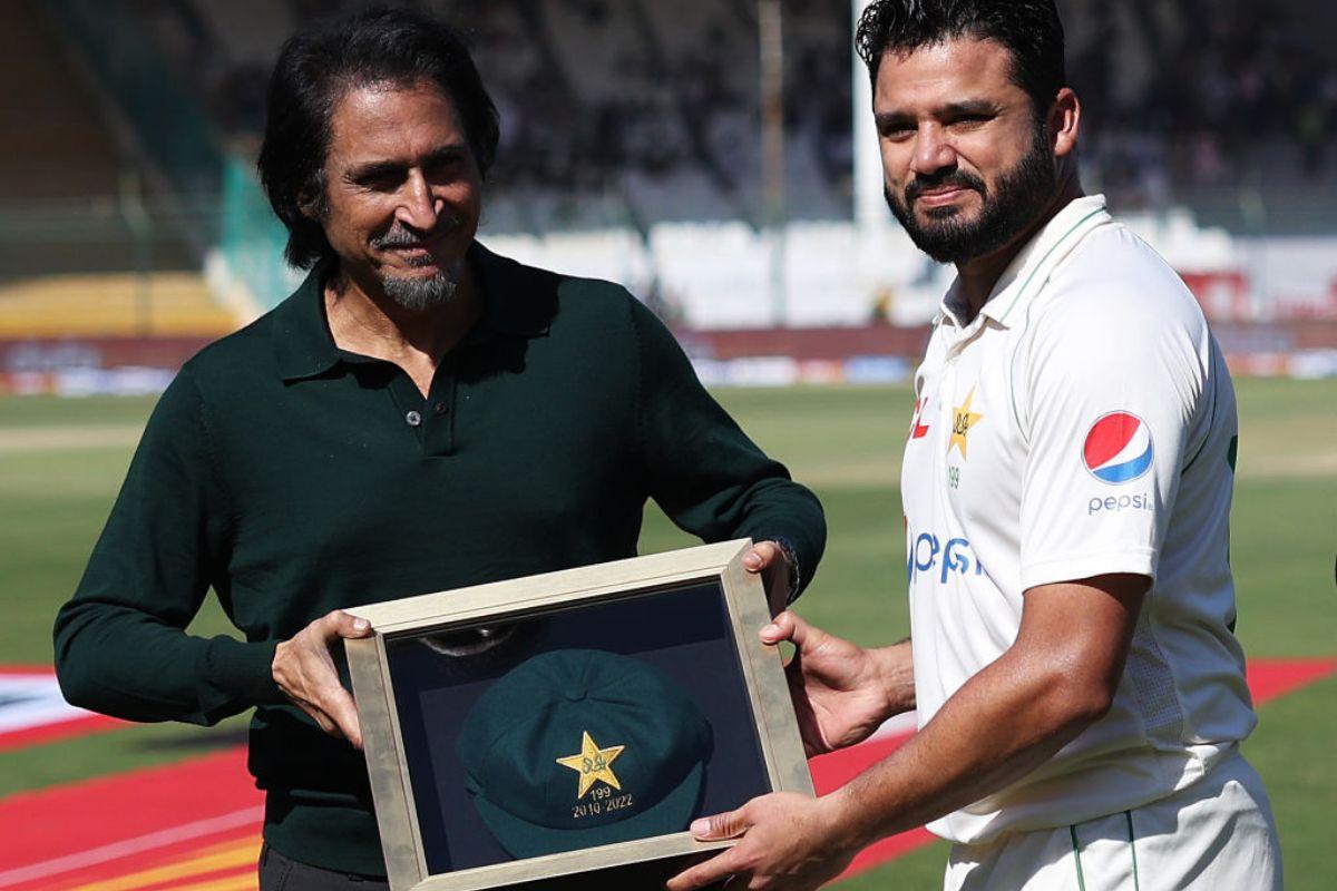   Ramiz Raja, Chairman of the PCB presents Azhar Ali of Pakistan with a cap