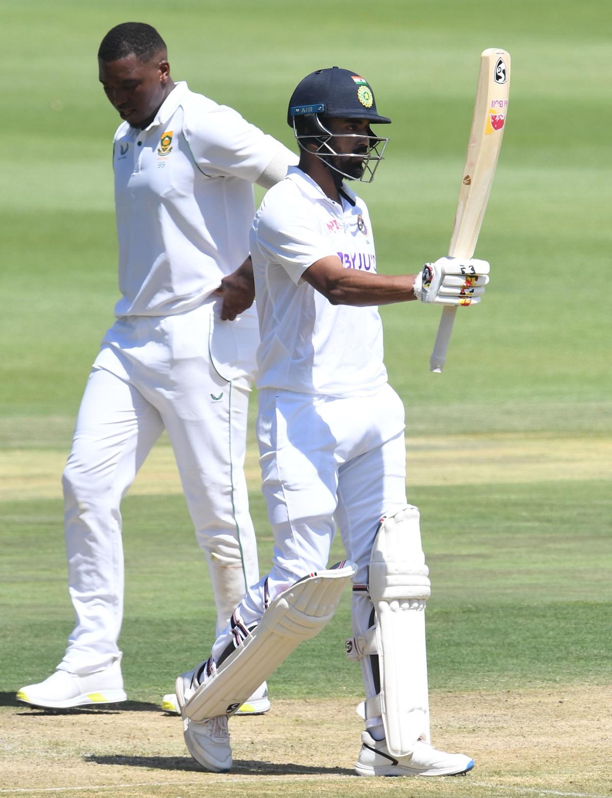 India opener K L Rahul celebrates scoring 50 runs.