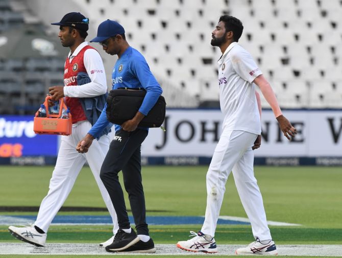 India pacer Mohammed Siraj walks off the field with an apparent injury during Day 1 of the second Test against South Africa, at the Imperial Wanderers Stadium in Johannesburg, on Monday.