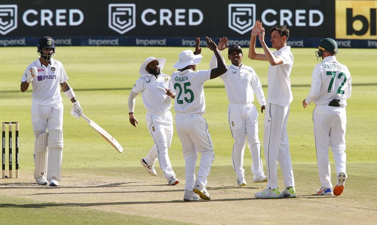 Marco Jansen celebrates with teammates after taking the wicket of India's stand-in captain K L Rahul.