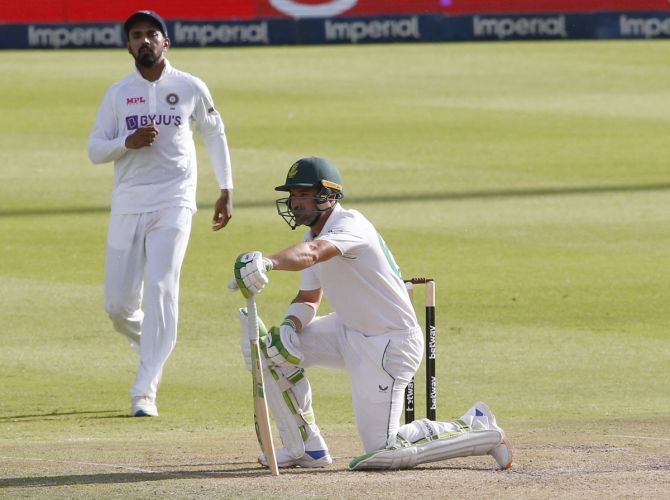 South Africa's Dean Elgar reacts after being hit on the helmet grille off the bowling of India's Jasprit Bumrah on Day 3 of the second Test, in Johannesburg, on Wednesday.