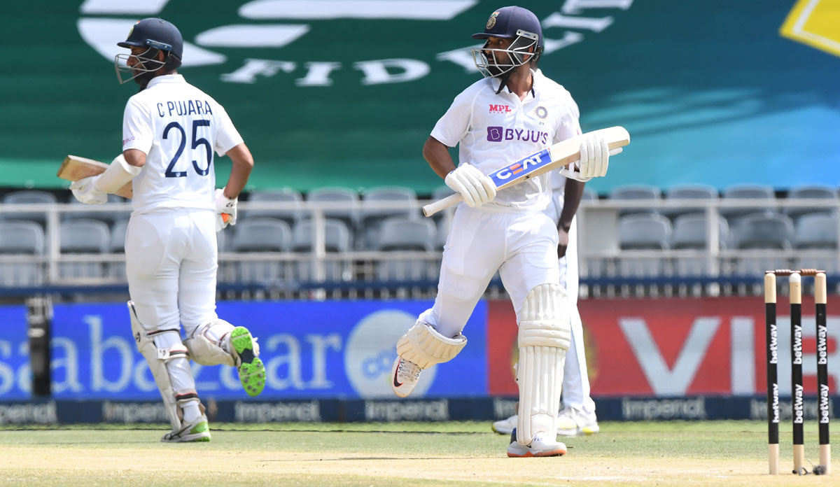 India's Ajinkya Rahane and Cheteshwar Pujara during their 111 runs partnership on Day 3 of the second Test against South Africa at Imperial Wanderers Stadium in Johannesburg, on January 05, 2022.