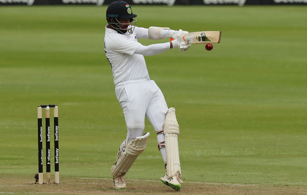 Cheteshwar Pujara dispatches the ball to the boundary during the morning session. 