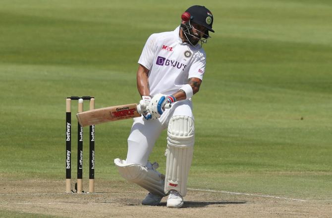 India skipper Virat Kohli swerves to avoid a bouncer.