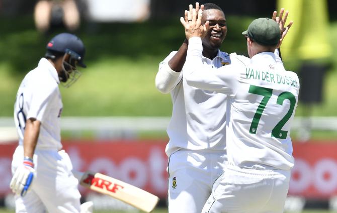 South Africa pacer Lungi Ngidi celebrates with Rassie van der Dussen after dismissing India skipper Virat Kohli.