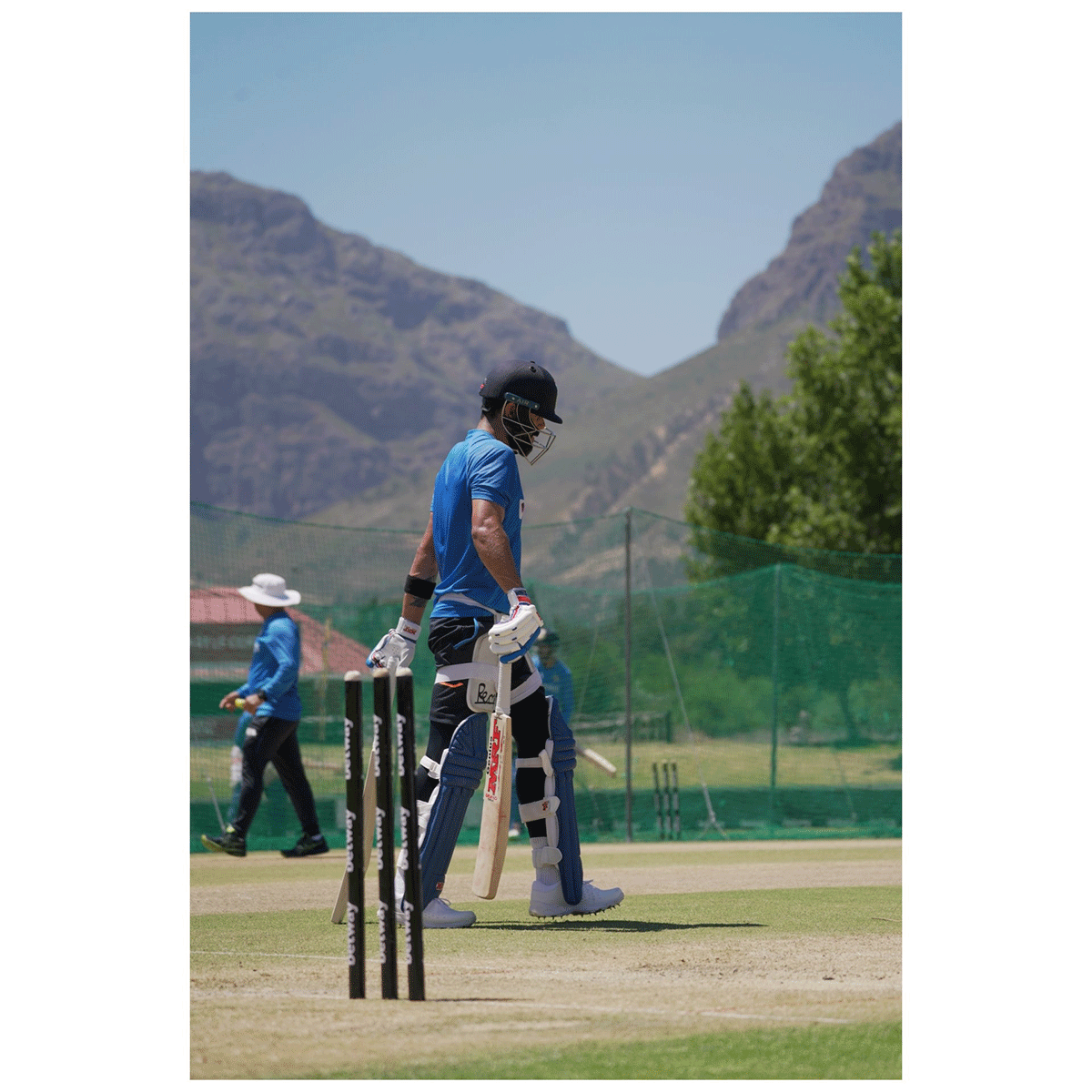 Virat Kohli goes out to bat in the nets