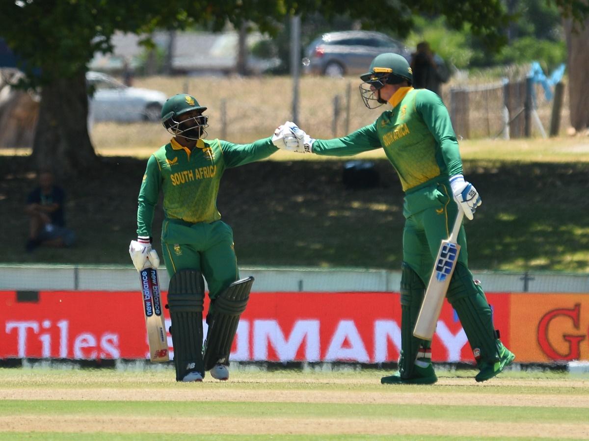 South Africa skipper Temba Bavuma is congratulated by Rassie van der Dussen after completing a half-century.