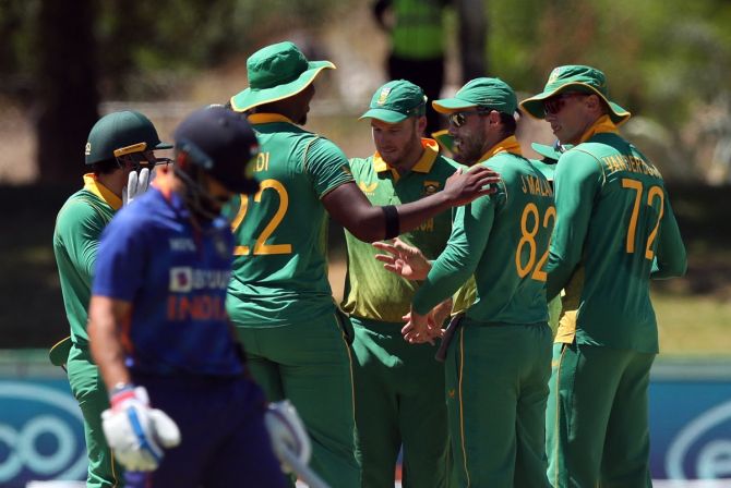 South Africa's players celebrate the wicket of India's Virat Kohli during the second ODI, in Paarl, on Friday.