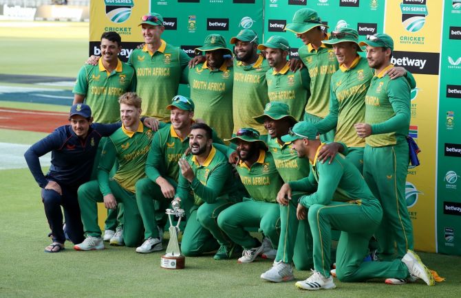 South Africa players pose with the series winners trophy after defeating India in the third ODI in Cape own on Sunday.