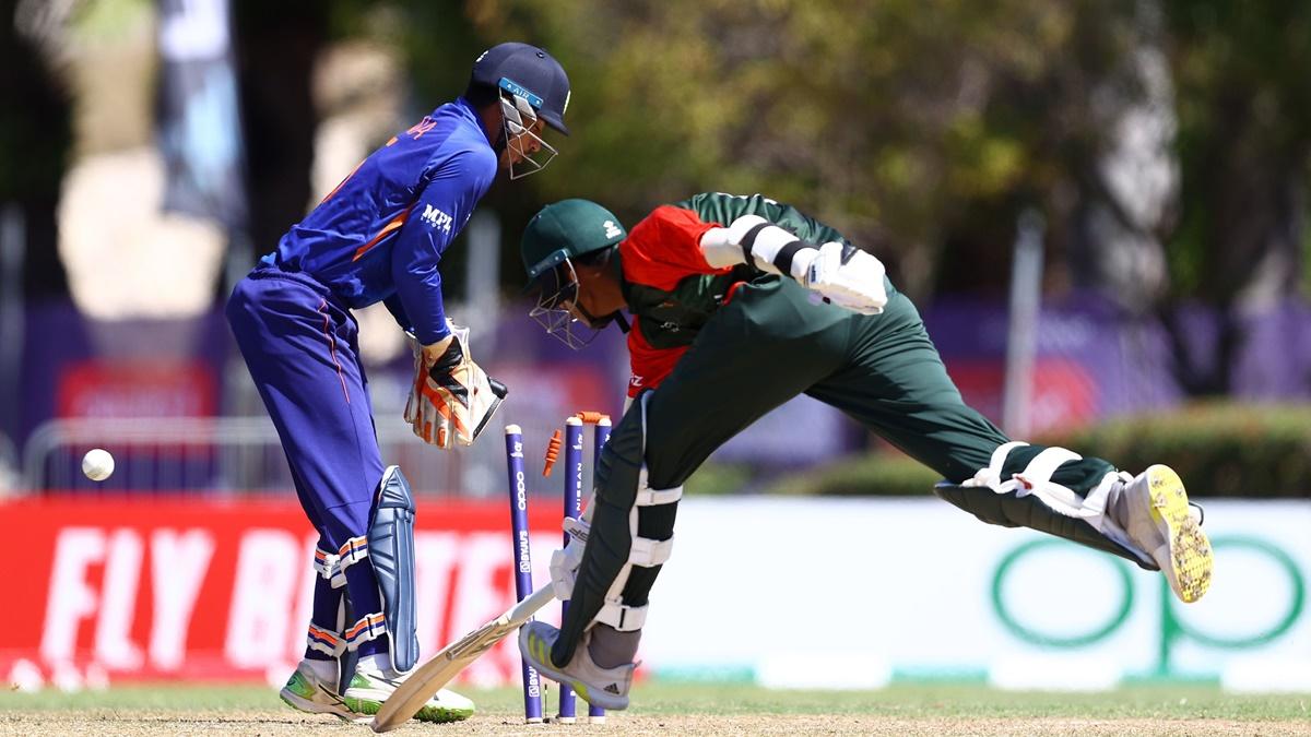 Bangladesh's Ashiqur Zaman is run-out by Siddarth Yadav.