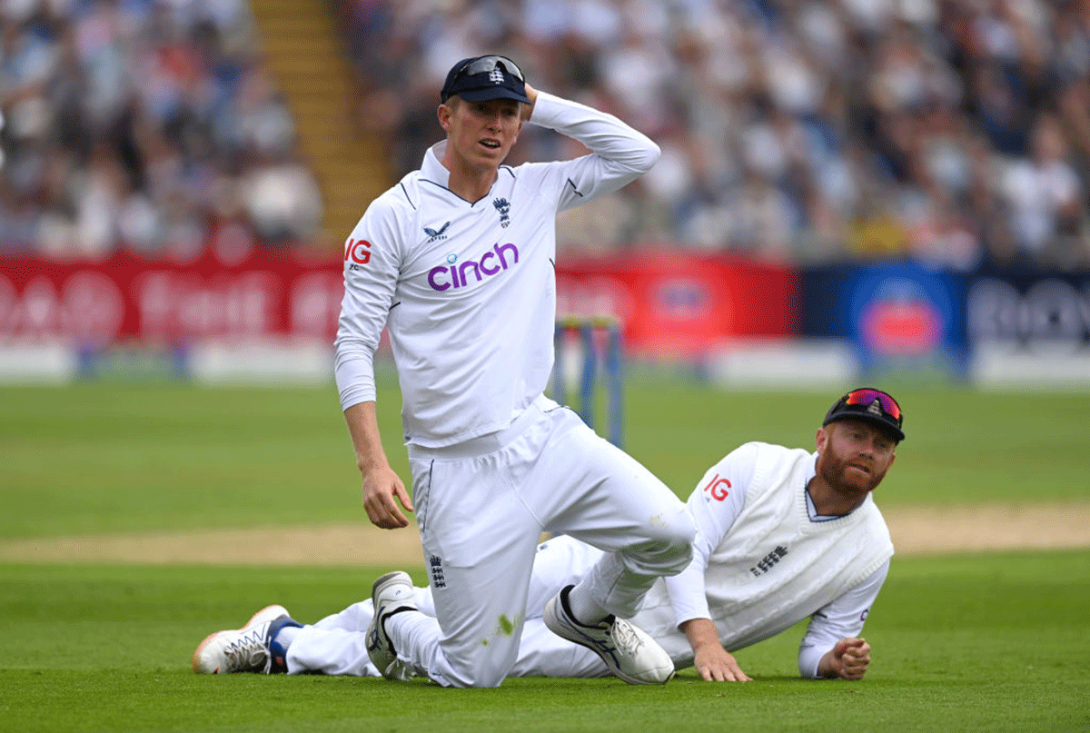 England's Zak Crawley reacts after dropping India's Hanuma Vihari