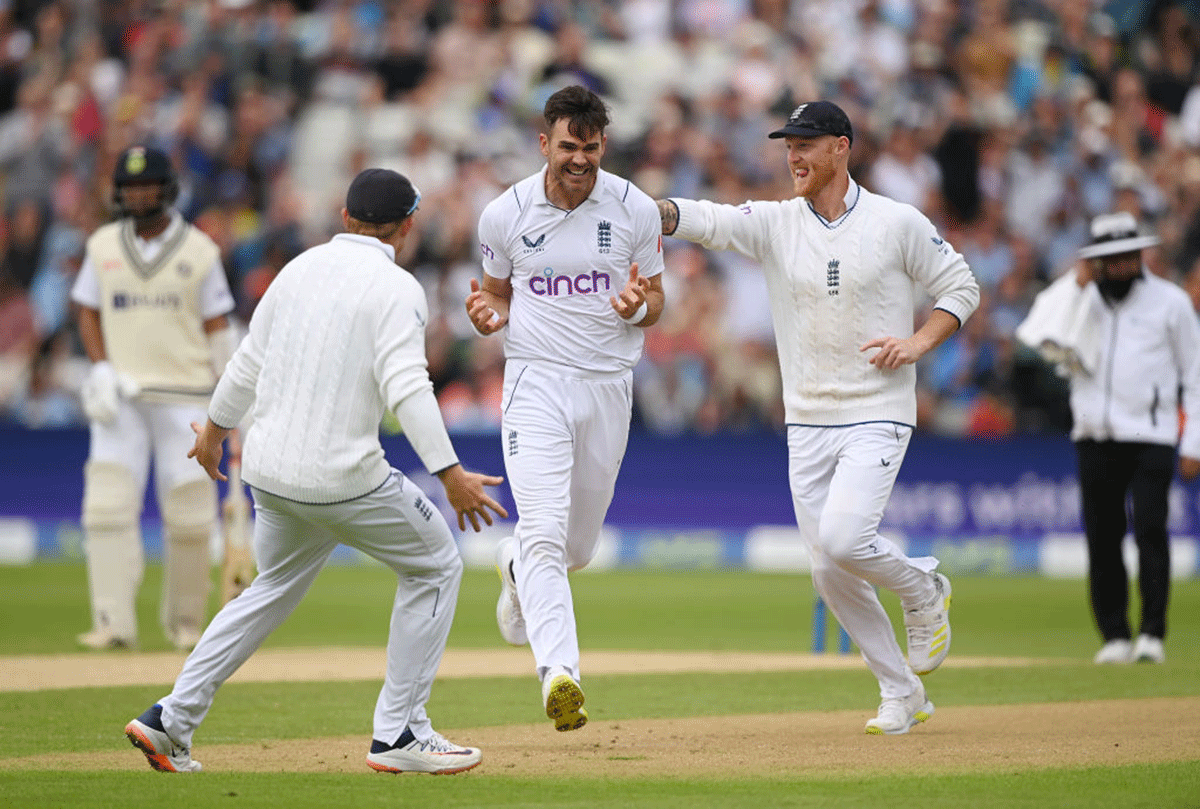 : James Anderson of England celebrates taking the wicket of Shubman Gill