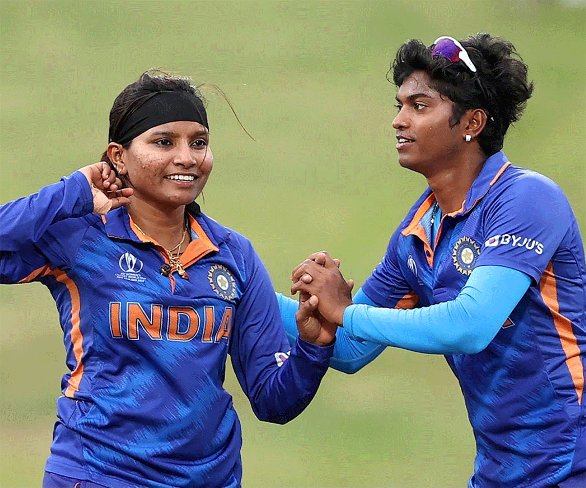 Pooja Vastrakar celebrates a wicket with a teammate