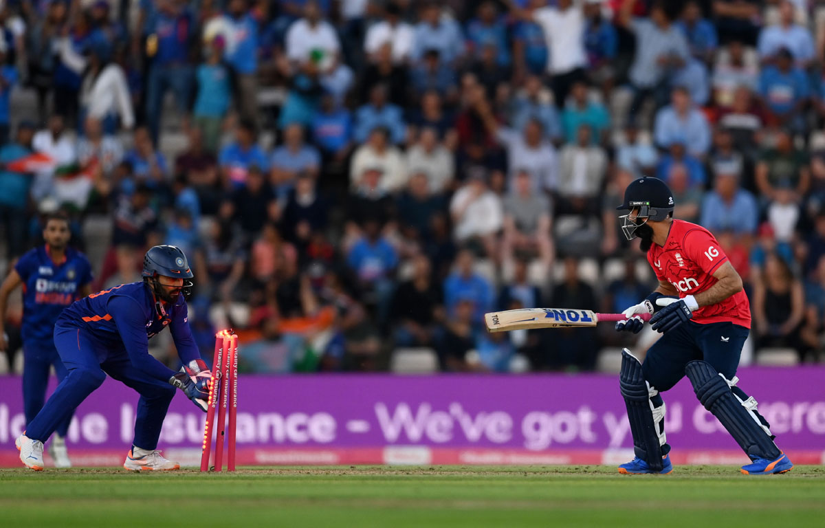 Moeen Ali is stumped by India wicketkeeper Dinesh Karthik off the bowling of Yuzvendra Chahal