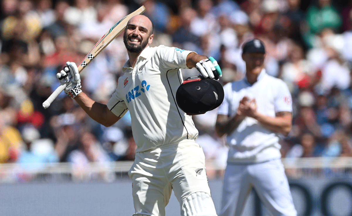New Zealand batsman Daryl Mitchell celebrates on completing his century  