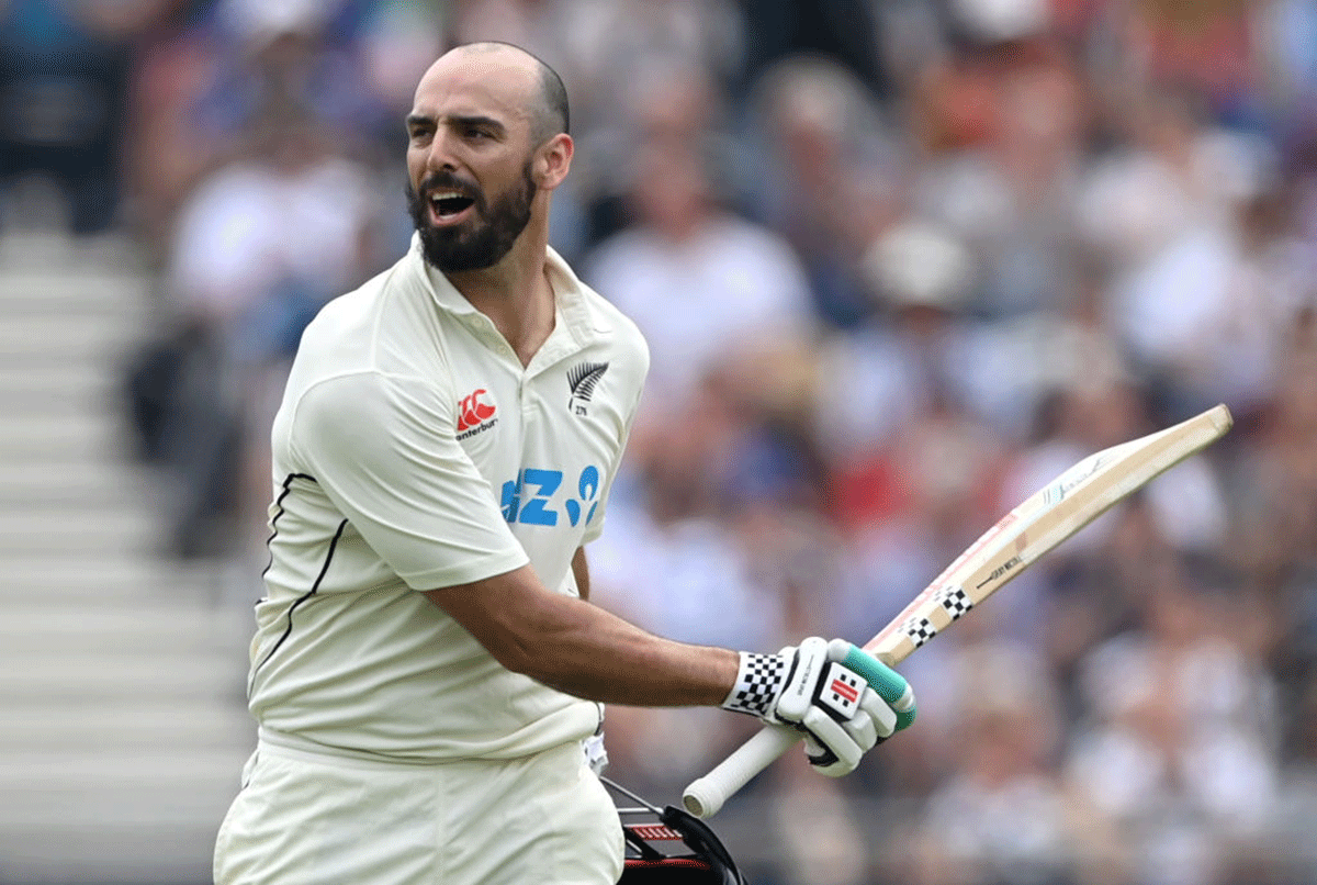 New Zealand's Daryl Mitchell celebrates after reaching his century 