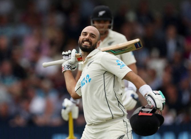 New Zealand's Daryl Mitchell celebrates completing his hundred on Day 2 of the third Test against England, at Yorkshire Cricket Ground, Leeds, on Friday.