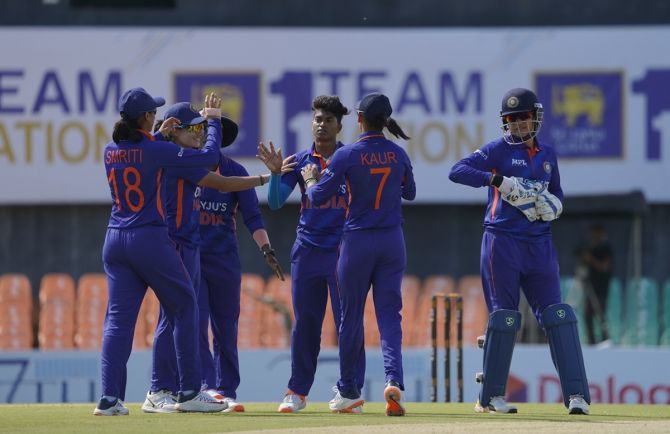 India's players celebrate the fall of a Sri Lanka wicket during the second women's T20I in Dambulla on Saturday.