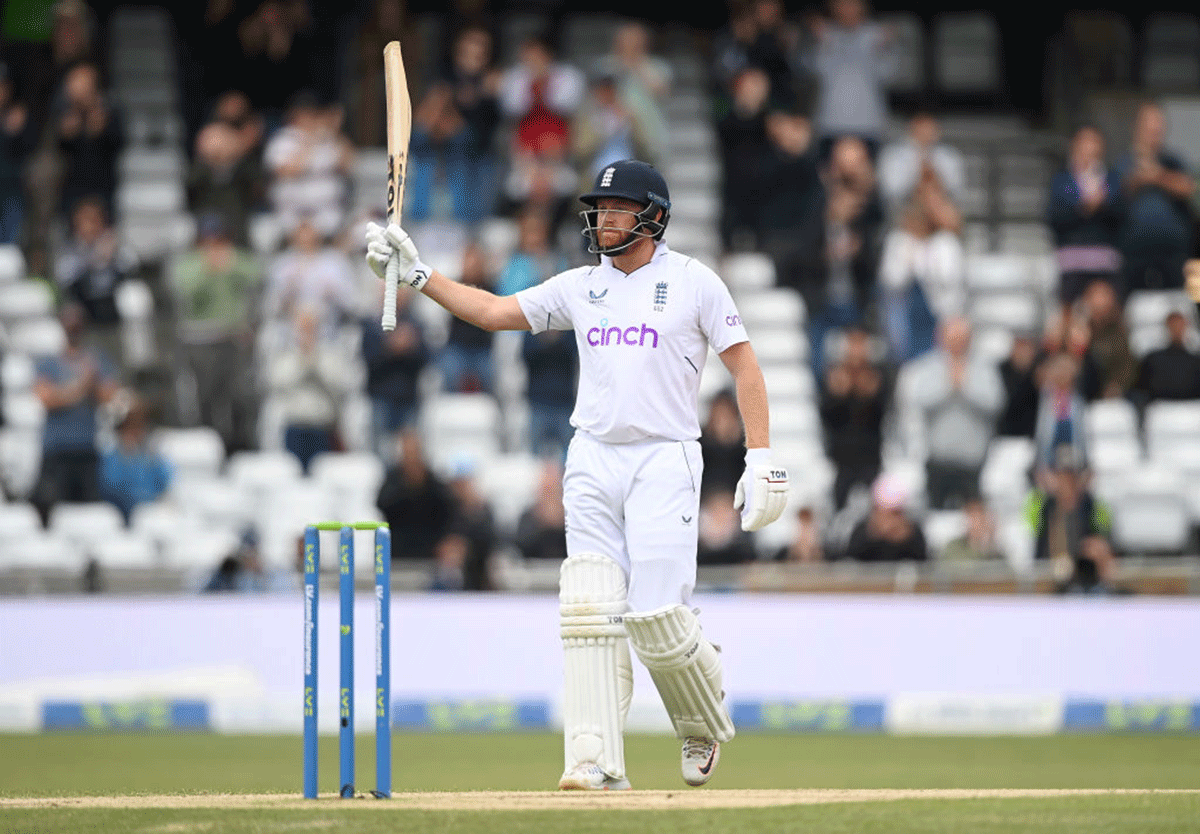 England's Jonny Bairstow celebrates on completing his half-century 