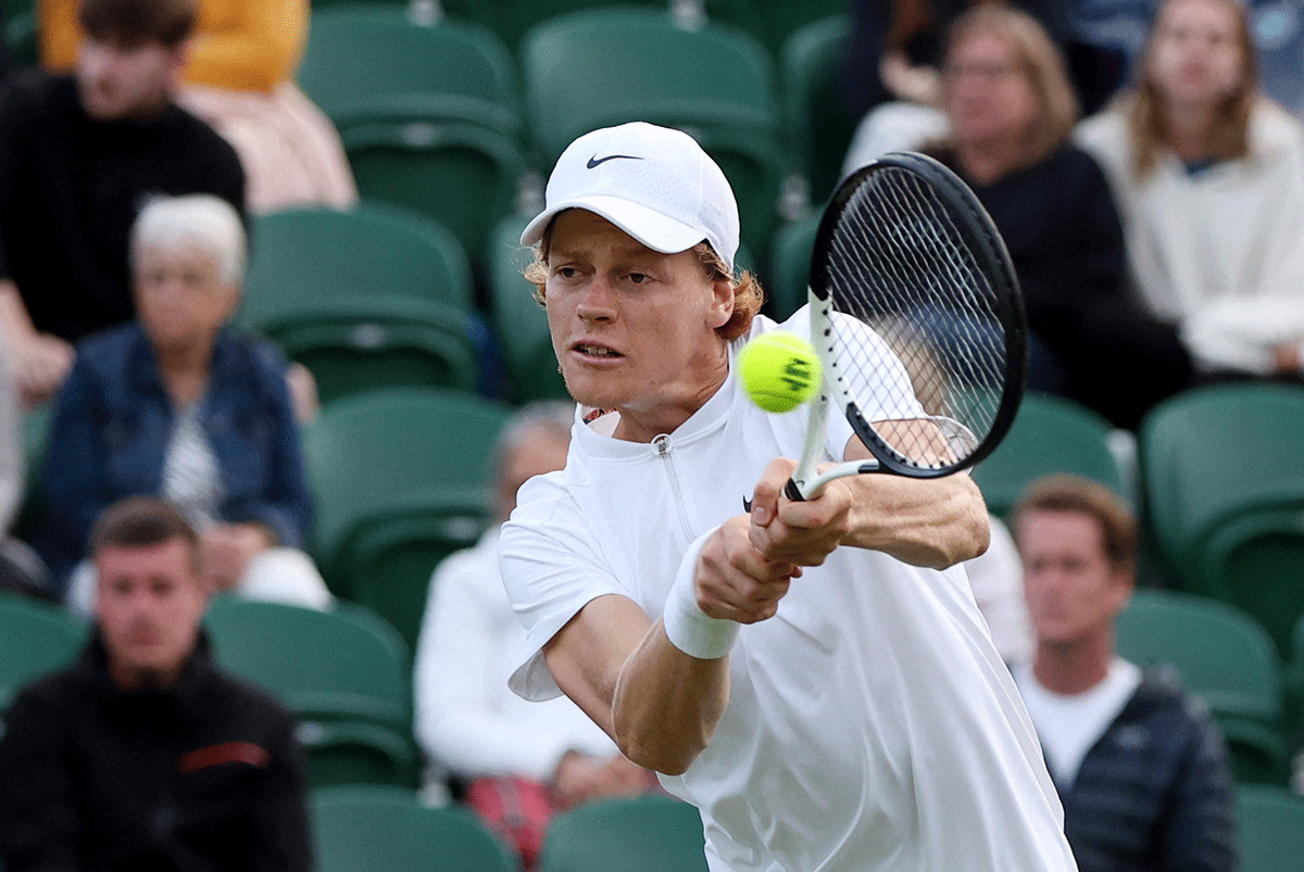 John Isner of the US in action during his second round match against France's Gregoire Barrere 