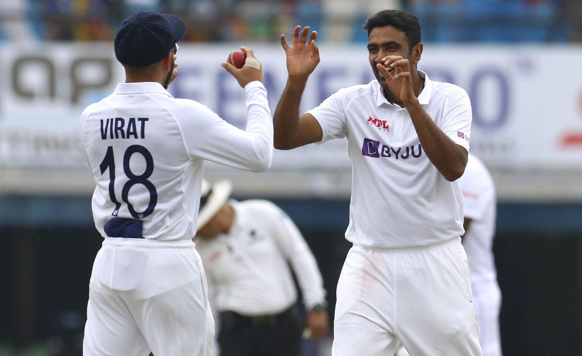 Ravichandran Ashwin celebrates with Virat Kohli after dismissing Charith Asalanka in Sri Lanka's second innings