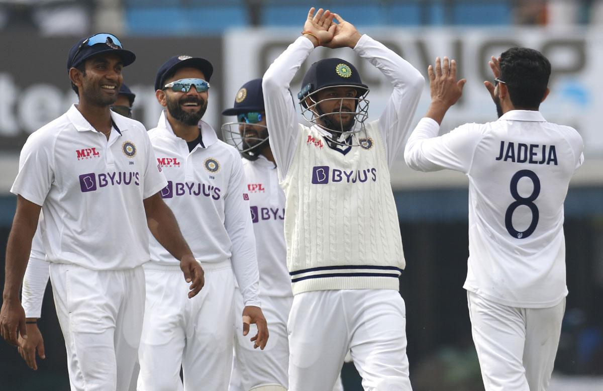 Ravindra Jadeja celebrates the wicket of Niroshan Dickwella.