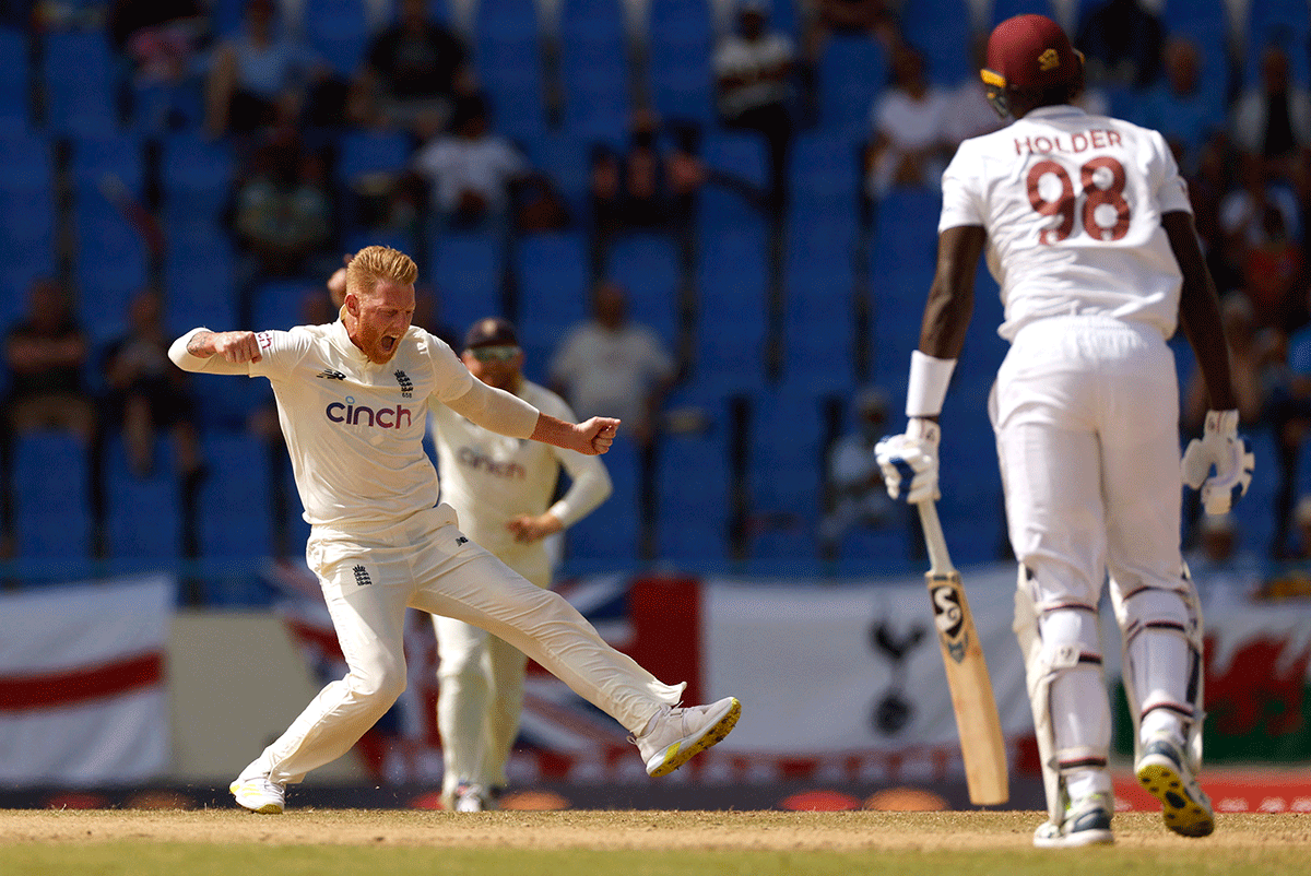 England's Ben Stokes celebrates taking the wicket of West Indies' Jason Holder 