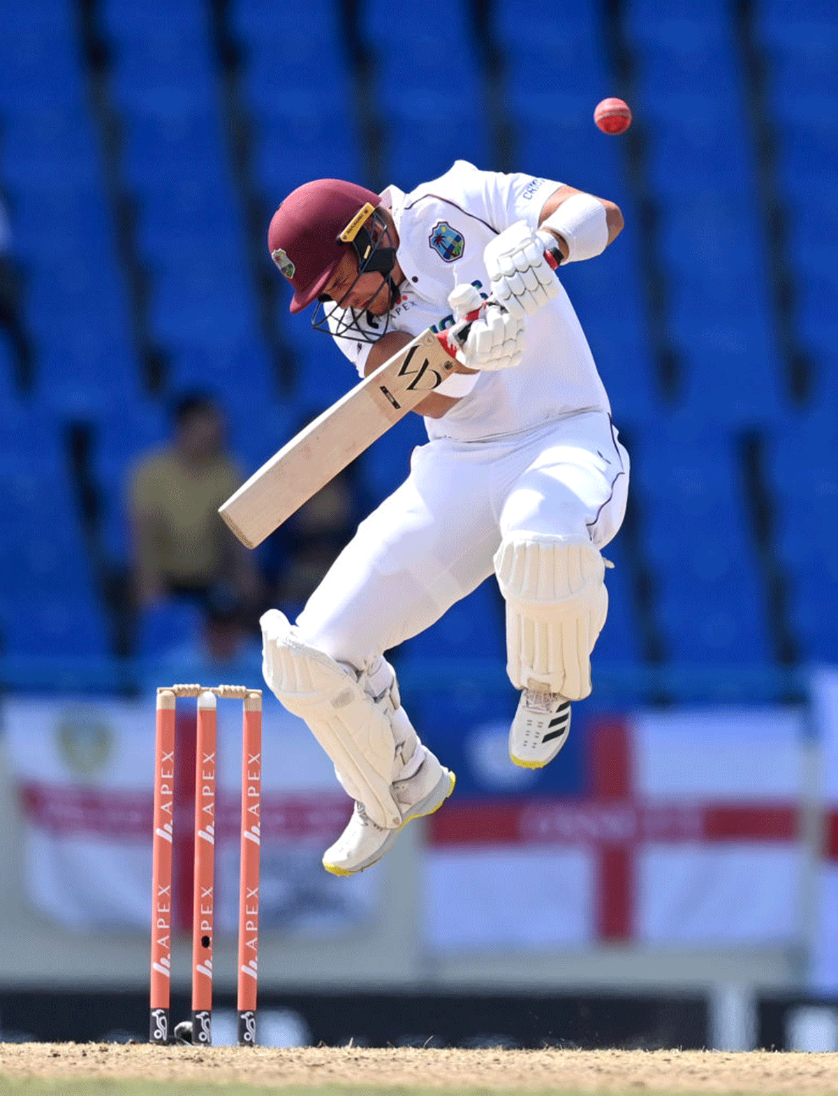 West Indies' Joshua Da Silva takes evasive action from a short ball bowled by England's Mark Wood