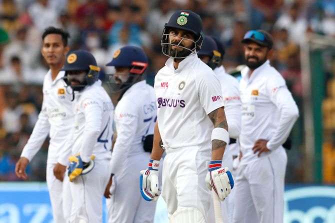 Virat Kohli reacts after being dismissed leg before wicket by Praveen Jayawickrama.