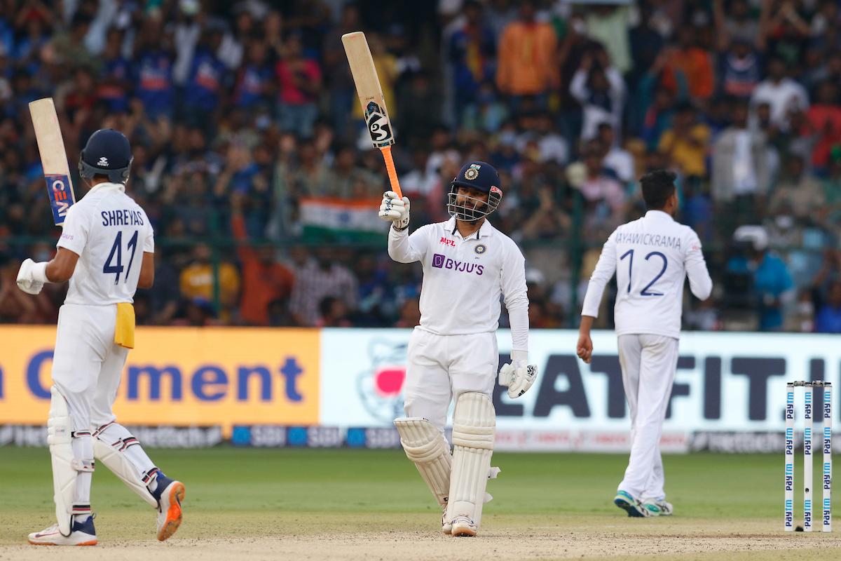 Rishabh Pant celebrates after completing a half-century off 28 balls in India's second innings on Day 2 of the second Test against Sri Lanka, in Bengaluru, on Sunday.