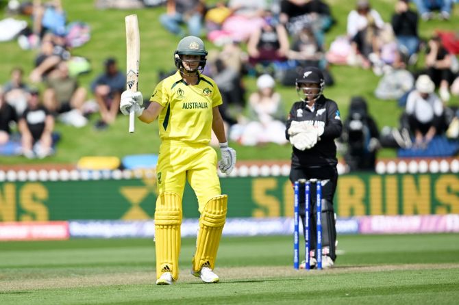 Australia's Ellyse Perry celebrates scoring 50 runs during the ICC Women's World Cup match against New Zealand, at Basin Reserve in Wellington, New Zealand, on Sunday.