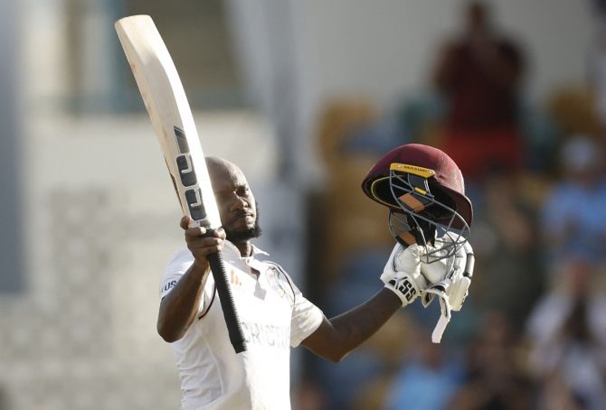 The West Indies' Jermaine Blackwood celebrates reaching a century on Day 3 of the second Test against England, at Kensington Oval, Bridgetown, Barbados, on Friday.