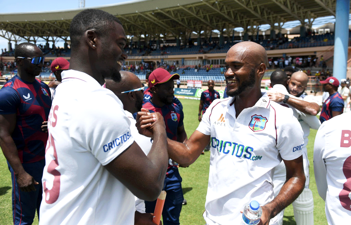 West Indies captain Kraigg Brathwaite celebrates with Jayden Seales after winning the 3rd Test match
