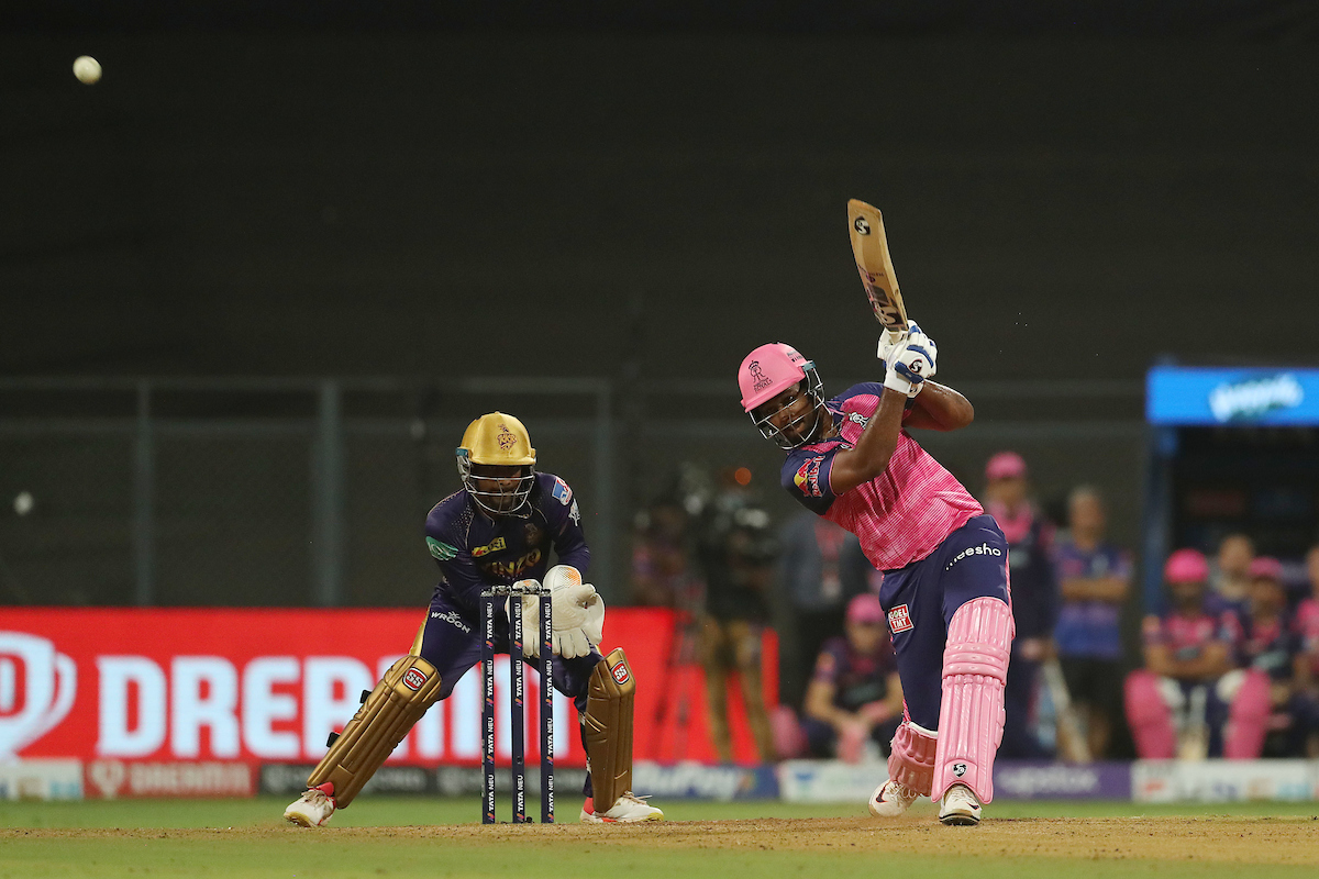 Rajasthan Royals skipper Sanju Samson hits over the top for six during the IPL match against Kolkata Knight Riders, at the Wankhede Stadium in Mumbai, on Monday.