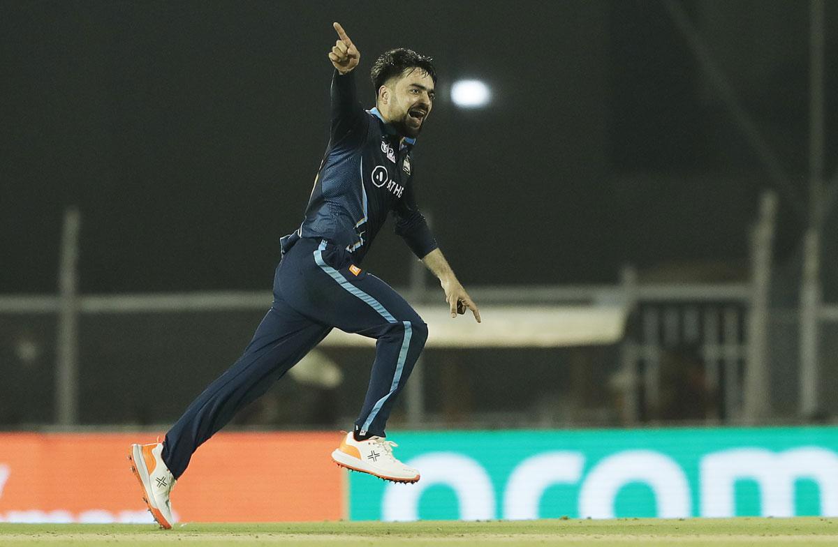 Rashid Khan celebrates after dismissing Kieron Pollard