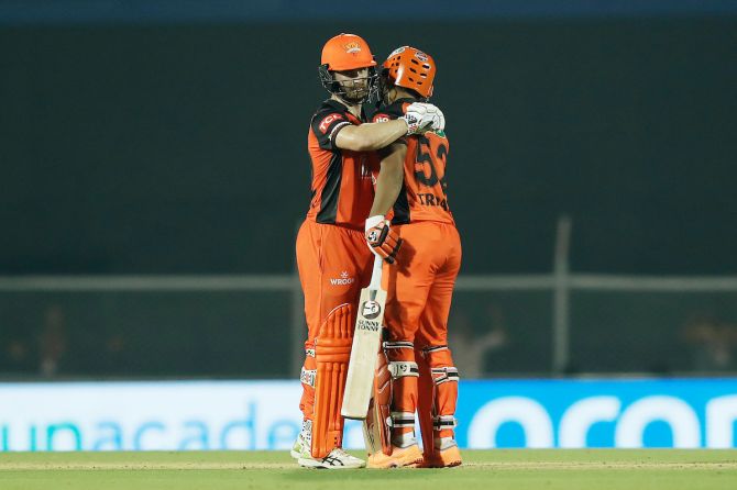 Sunrisers Hyderabad batters Rahul Tripathi and Kane Williamson celebrate victory over Royal Challengers Bangalore in their first meeting of IPL 2022 at the Brabourne Stadium in Mumbai on the April 23.