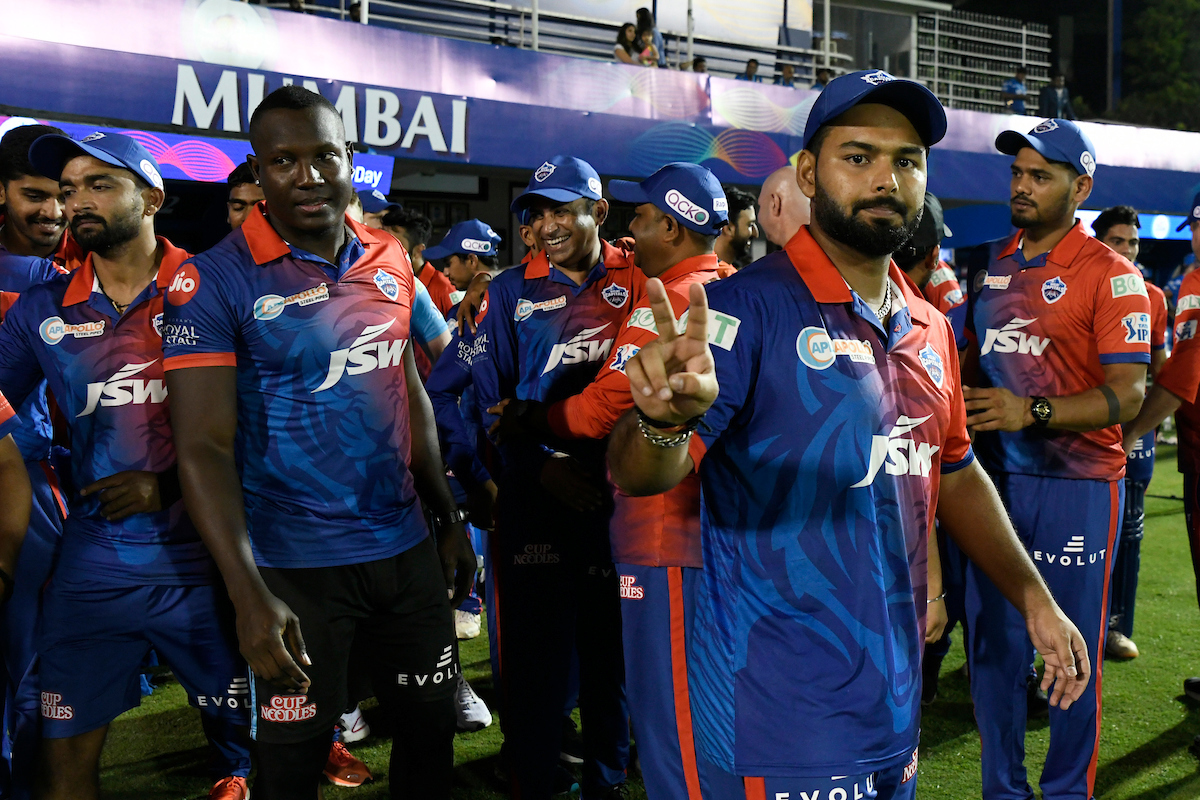 Delhi Capitals captain Rishabh Pant with his team in the dugout