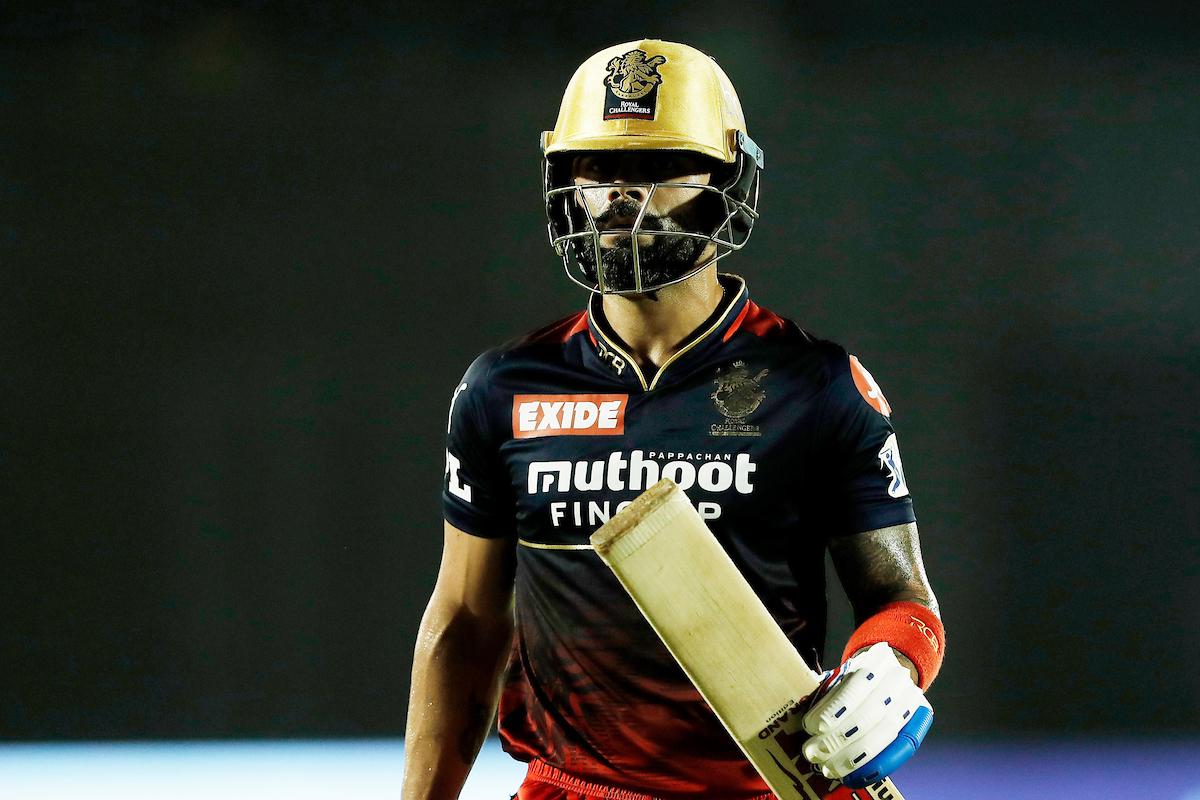 Royal Challengers Bangalore’s Virat Kohli walks back after being dismissed during the IPL match against Punjab Kings at the Brabourne Stadium in Mumbai on Friday