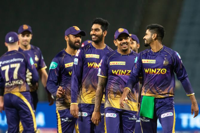 The jubilant Kolkata Knight Riders players walk back after scoring a thumping victory over Sunrisers Hyderabad in the IPL match in Pune on Saturday.