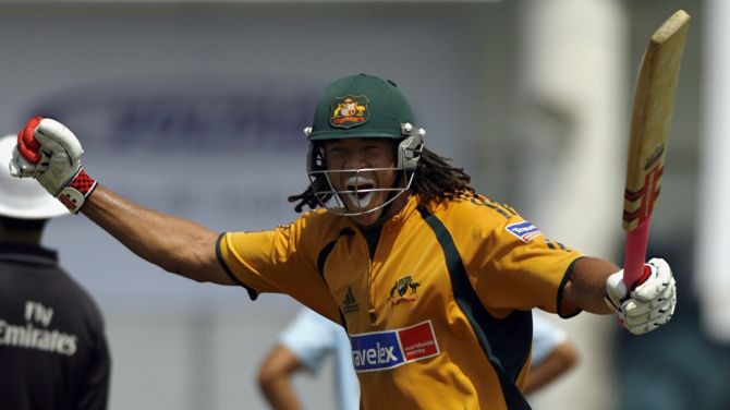Australia's Andrew Symonds celebrates after scoring a century against India during the sixth One-Day International in Nagpur, October 14, 2007. 
