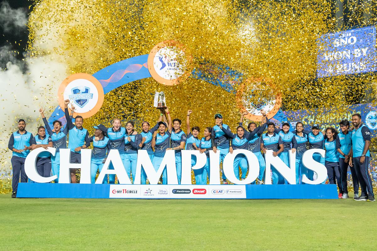 The Supernovas celebrate with the trophy after defeating Velocity in the final of My11Circle Women’s T20 Challenge, at the MCA International Stadium in Pune on Saturday.